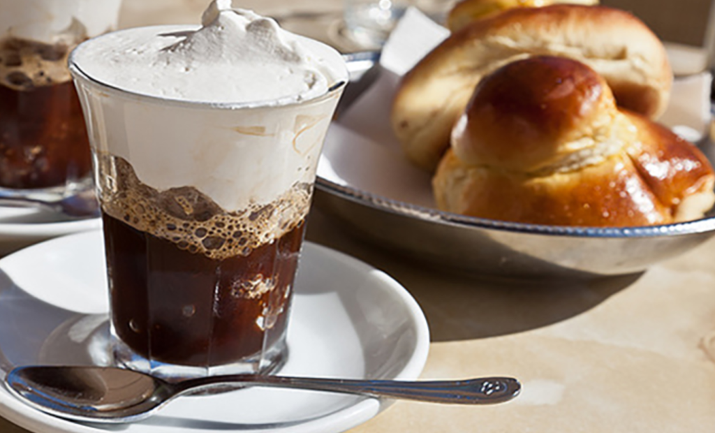 Premium Photo Traditional sicilian granita coffee flavor with brioche close up